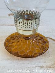 MaxSold Auction: Vintage Electric Hurricane Lamp with Amber Coloured Base and Clear Shade  - Kingston (Ontario, Canada) SELLER MANAGED Downsizing Online Auction - Bishop Street