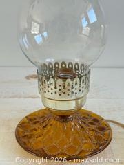 MaxSold Auction: Vintage Electric Hurricane Lamp with Amber Coloured Base and Clear Shade  - Kingston (Ontario, Canada) SELLER MANAGED Downsizing Online Auction - Bishop Street
