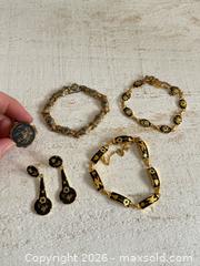 MaxSold Auction: Vintage Enamel and Brass Etched Jewelry Lot - Locket, Three Bracelets and Earrings  - Kingston (Ontario, Canada) SELLER MANAGED Downsizing Online Auction - Bishop Street