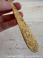 MaxSold Auction: Vintage Golden Lifetime Cutlery Cake Server with Floral Handle  - Kingston (Ontario, Canada) SELLER MANAGED Downsizing Online Auction - Bishop Street