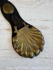 MaxSold Auction: Vintage Horse Brass on Leather Strap - Shell Shaped Horse Martingale  - Kingston (Ontario, Canada) SELLER MANAGED Downsizing Online Auction - Bishop Street