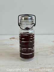 MaxSold Auction: Vintage Large Glass Pepper Shaker by Wheaton Glass USA - Kingston (Ontario, Canada) SELLER MANAGED Downsizing Online Auction - Bishop Street