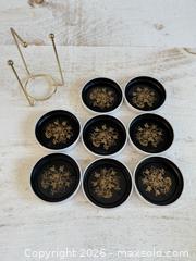 MaxSold Auction: Vintage Stacking Metal Coasters - Black and White with Gold Print and Brass Holder - Kingston (Ontario, Canada) SELLER MANAGED Downsizing Online Auction - Bishop Street