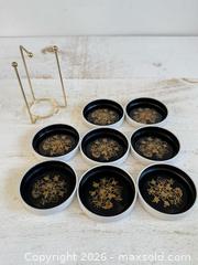 MaxSold Auction: Vintage Stacking Metal Coasters - Black and White with Gold Print and Brass Holder - Kingston (Ontario, Canada) SELLER MANAGED Downsizing Online Auction - Bishop Street