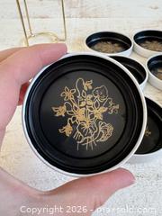 MaxSold Auction: Vintage Stacking Metal Coasters - Black and White with Gold Print and Brass Holder - Kingston (Ontario, Canada) SELLER MANAGED Downsizing Online Auction - Bishop Street