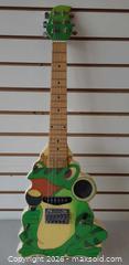 MaxSold Auction: Unknown/Custom 6-String Solid Body Electric Guitar with Frog Graphic - Toronto (Ontario, Canada) PARTNER MANAGED Reseller Online Auction - Queen Street West