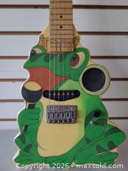MaxSold Auction: Unknown/Custom 6-String Solid Body Electric Guitar with Frog Graphic - Toronto (Ontario, Canada) PARTNER MANAGED Reseller Online Auction - Queen Street West