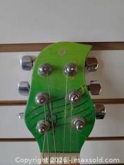MaxSold Auction: Unknown/Custom 6-String Solid Body Electric Guitar with Frog Graphic - Toronto (Ontario, Canada) PARTNER MANAGED Reseller Online Auction - Queen Street West