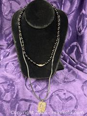 MaxSold Auction: Sterling Silver .925  16" Black Oynx & Silver findings Necklace / Silk Cord w/ Sterling 'Dance' Pendant - Idaho Springs (Colorado, USA) PARTNER MANAGED Estate Sale Online Auction - Idaho Street