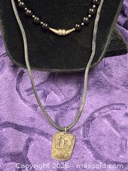 MaxSold Auction: Sterling Silver .925  16" Black Oynx & Silver findings Necklace / Silk Cord w/ Sterling 'Dance' Pendant - Idaho Springs (Colorado, USA) PARTNER MANAGED Estate Sale Online Auction - Idaho Street