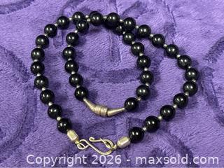 MaxSold Auction: Sterling Silver .925  16" Black Oynx & Silver findings Necklace / Silk Cord w/ Sterling 'Dance' Pendant - Idaho Springs (Colorado, USA) PARTNER MANAGED Estate Sale Online Auction - Idaho Street