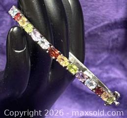 MaxSold Auction: Sterling Silver .925  Bangle Bracelet w/ Multi Colored Semi Precious cut Stones Double safety Clasp  - Idaho Springs (Colorado, USA) PARTNER MANAGED Estate Sale Online Auction - Idaho Street