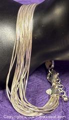 MaxSold Auction:  Sterling Silver 925 Dyadema Liquid Silver Bracelet  7"-8"   12.91 grams  - Idaho Springs (Colorado, USA) PARTNER MANAGED Estate Sale Online Auction - Idaho Street