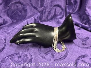 MaxSold Auction:  Sterling Silver 925 Dyadema Liquid Silver Bracelet  7"-8"   12.91 grams  - Idaho Springs (Colorado, USA) PARTNER MANAGED Estate Sale Online Auction - Idaho Street