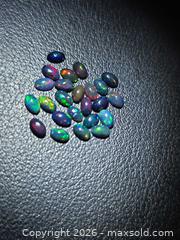 MaxSold Auction: Natural calibrated black opal lot  - Hamilton (Ontario, Canada) PARTNER MANAGED Reseller Online Auction - Mohawk Road West