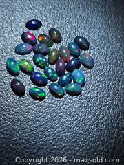 MaxSold Auction: Natural calibrated black opal lot  - Hamilton (Ontario, Canada) PARTNER MANAGED Reseller Online Auction - Mohawk Road West