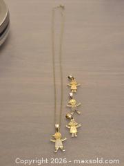 MaxSold Auction: 14K Yellow Gold Necklace + Children's Figure Charms, 6.5 g - Toronto (Ontario, Canada) PARTNER MANAGED Estate Sale Online Auction - Cobden