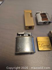 MaxSold Auction: Set of 7 Vintage Brass & Chrome Pocket and Table Lighters - Toronto (Ontario, Canada) PARTNER MANAGED Estate Sale Online Auction - Cobden Street