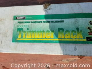 MaxSold Auction: New in Box Buyers Lockable Professional Landscaping Trimmer Rack - East Zorra-Tavistock (Ontario, Canada) SELLER MANAGED Downsizing Online Auction - Highway 59 Lot 92