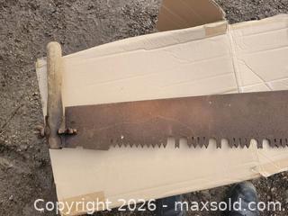 MaxSold Auction: Vintage 69" Wooden Handle Crosscut Saw - East Zorra-Tavistock (Ontario, Canada) SELLER MANAGED Downsizing Online Auction - Highway 59 Lot 92