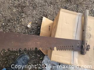 MaxSold Auction: Vintage Wooden Handle 64" Crosscut Saw - East Zorra-Tavistock (Ontario, Canada) SELLER MANAGED Downsizing Online Auction - Highway 59 Lot 92