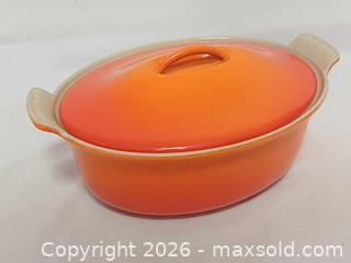 MaxSold Auction: Vintage Le Creuset Orange Enameled Cast Iron Oval Dutch Oven #26 - Toronto (Ontario, Canada) PARTNER MANAGED Reseller Online Auction - Queen Street Wt.