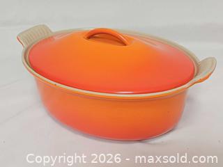 MaxSold Auction: Vintage Le Creuset Orange Enameled Cast Iron Oval Dutch Oven #26 - Toronto (Ontario, Canada) PARTNER MANAGED Reseller Online Auction - Queen Street Wt.