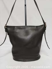 MaxSold Auction: Vintage Roots Canada Black Leather Bucket Shoulder Bag  - Toronto (Ontario, Canada) PARTNER MANAGED Reseller Online Auction - Queen Street West