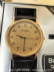 MaxSold Auction: Bulova Dress Watch - Gold Tone Case, Black Leather Band - San Jose (California, USA) SELLER MANAGED Downsizing Online Auction - East Humboldt Street