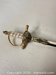 MaxSold Auction: Toledo Marked Decorative Dagger, 12 in, Brass Finish - San Jose (California, USA) SELLER MANAGED Downsizing Online Auction - East Humboldt Street