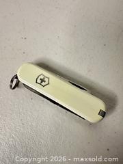 MaxSold Auction: Victorinox Swiss Army Cutter San Francisco 49ers White/Cream - San Jose (California, USA) SELLER MANAGED Downsizing Online Auction - East Humboldt Street
