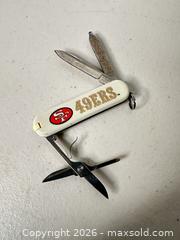 MaxSold Auction: Victorinox Swiss Army Cutter San Francisco 49ers White/Cream - San Jose (California, USA) SELLER MANAGED Downsizing Online Auction - East Humboldt Street
