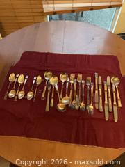 MaxSold Auction: 25-Piece Mixed-Material Flatware Set (Unmarked) with Roll Case - Coquitlam (British Columbia, Canada) SELLER MANAGED Reseller Online Auction - Robson Drive