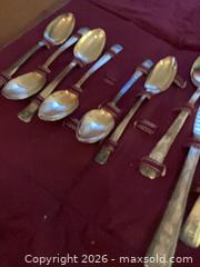 MaxSold Auction: 25-Piece Mixed-Material Flatware Set (Unmarked) with Roll Case - Coquitlam (British Columbia, Canada) SELLER MANAGED Reseller Online Auction - Robson Drive