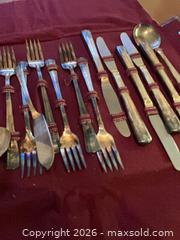 MaxSold Auction: 25-Piece Mixed-Material Flatware Set (Unmarked) with Roll Case - Coquitlam (British Columbia, Canada) SELLER MANAGED Reseller Online Auction - Robson Drive