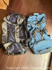 MaxSold Auction: Large Blue/Navy Wheeled Duffel Rolling Luggage, Polyester - Coquitlam (British Columbia, Canada) SELLER MANAGED Reseller Online Auction - Robson Drive