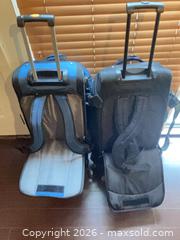 MaxSold Auction: Large Blue/Navy Wheeled Duffel Rolling Luggage, Polyester - Coquitlam (British Columbia, Canada) SELLER MANAGED Reseller Online Auction - Robson Drive