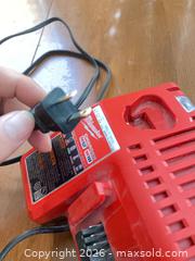 MaxSold Auction: Milwaukee M12 / M18 Charger, 120 V AC, Red - Coquitlam (British Columbia, Canada) SELLER MANAGED Reseller Online Auction - Robson Drive