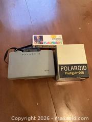 MaxSold Auction: Polaroid Automatic 210 / Land Camera 210 (Instant Pack-Film) - Coquitlam (British Columbia, Canada) SELLER MANAGED Reseller Online Auction - Robson Drive