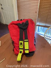 MaxSold Auction: Red Emergency First Aid Backpack with Reflective Strips - Coquitlam (British Columbia, Canada) SELLER MANAGED Reseller Online Auction - Robson Drive
