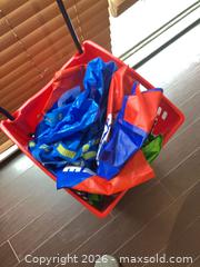 MaxSold Auction: Red Plastic Rolling Shopping Basket with Telescoping Handle - Coquitlam (British Columbia, Canada) SELLER MANAGED Reseller Online Auction - Robson Drive