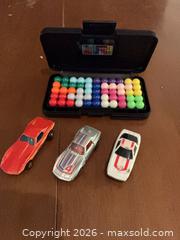 MaxSold Auction: Three Diecast Toy Cars with Kanoodle Travel Puzzle (Case Included) - Coquitlam (British Columbia, Canada) SELLER MANAGED Reseller Online Auction - Robson Drive