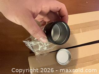 MaxSold Auction: Uline 2 oz Black Metal Tins — 48 Tins per Carton - Coquitlam (British Columbia, Canada) SELLER MANAGED Reseller Online Auction - Robson Drive