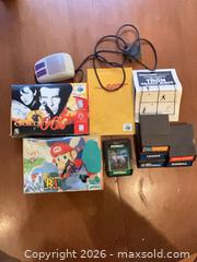 MaxSold Auction: Vintage Game Manuals, Cartridges & Boxes — Multiple Platforms - Coquitlam (British Columbia, Canada) SELLER MANAGED Reseller Online Auction - Robson Drive