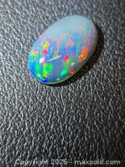 MaxSold Auction: Huge play of color natural black opal - Mississauga (Ontario, Canada) PARTNER MANAGED Reseller Online Auction - South Gateway Road