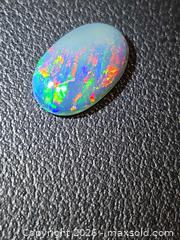 MaxSold Auction: Huge play of color natural black opal - Mississauga (Ontario, Canada) PARTNER MANAGED Reseller Online Auction - South Gateway Road