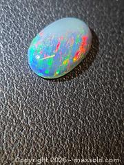 MaxSold Auction: Huge play of color natural black opal - Mississauga (Ontario, Canada) PARTNER MANAGED Reseller Online Auction - South Gateway Road