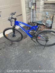 MaxSold Auction: Blue CCM Full-Suspension Mountain Bike, 26-inch Wheels - King (Ontario, Canada) SELLER MANAGED Moving Online Auction -  Wells Orchard Crescent
