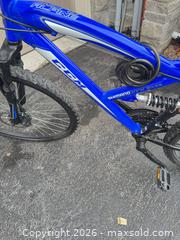 MaxSold Auction: Blue CCM Full-Suspension Mountain Bike, 26-inch Wheels - King (Ontario, Canada) SELLER MANAGED Moving Online Auction -  Wells Orchard Crescent