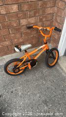 MaxSold Auction: Supercycle Kids’ Bike – Orange (12”) - Clarington (Ontario, Canada) SELLER MANAGED Moving Online Auction - Cornish Drive